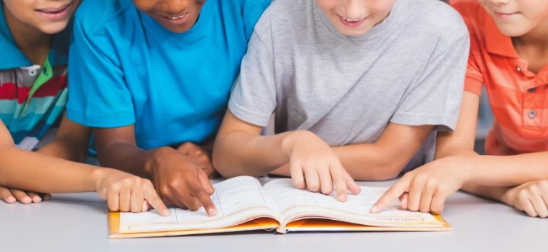 students reading from naplan year 5 book